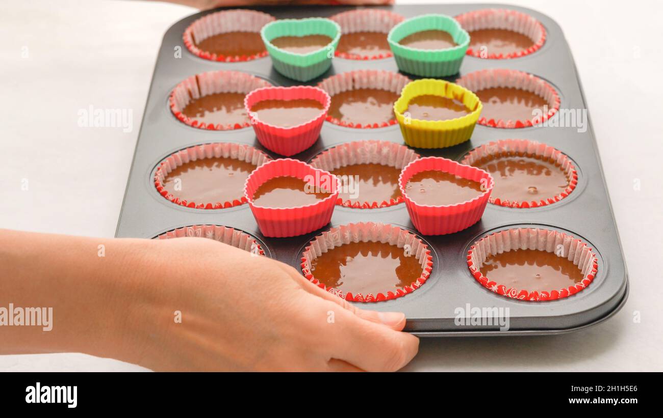 Chocolate cupcakes recipe. Cupcake pan lined with paper liners, and