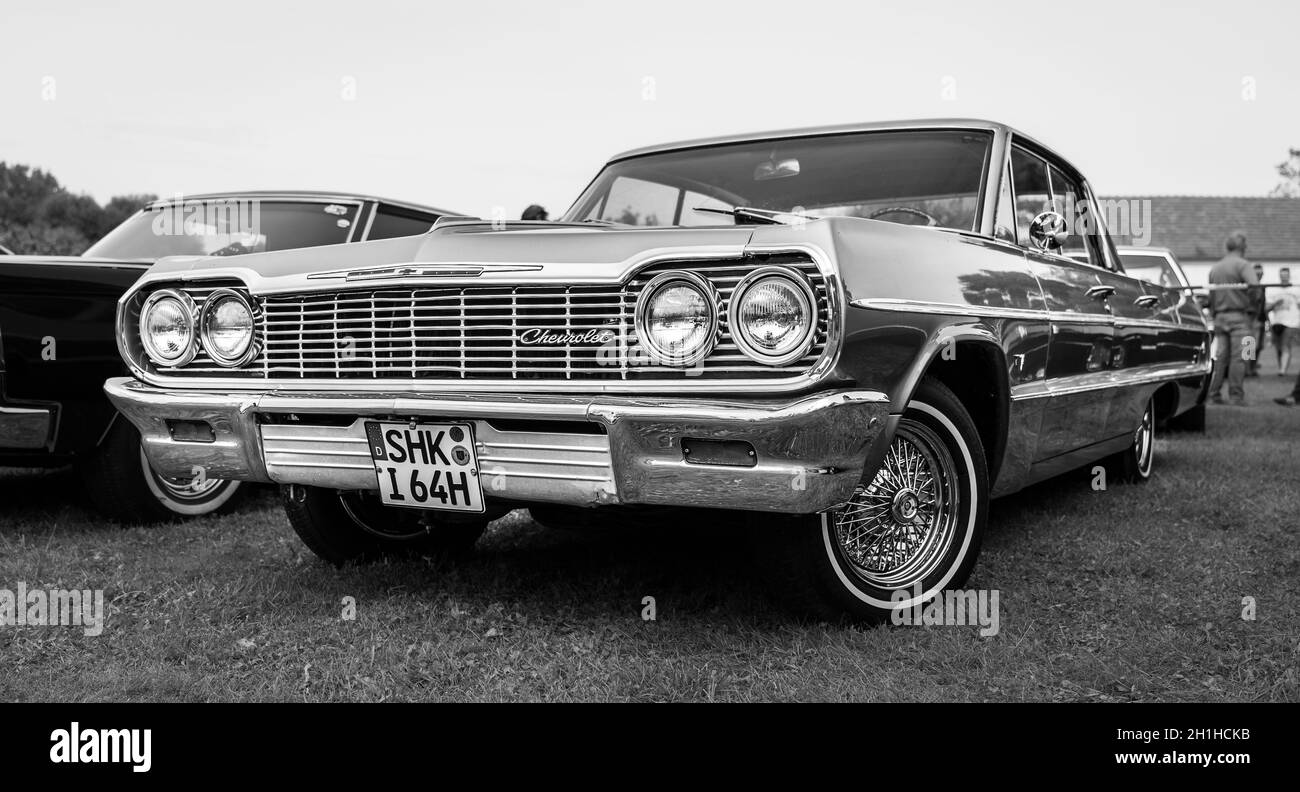 DIEDERSDORF, GERMANY - AUGUST 30, 2020: The full-size car Chevrolet Impala, 1964. Black and white. The exhibition of 'US Car Classics'. Stock Photo
