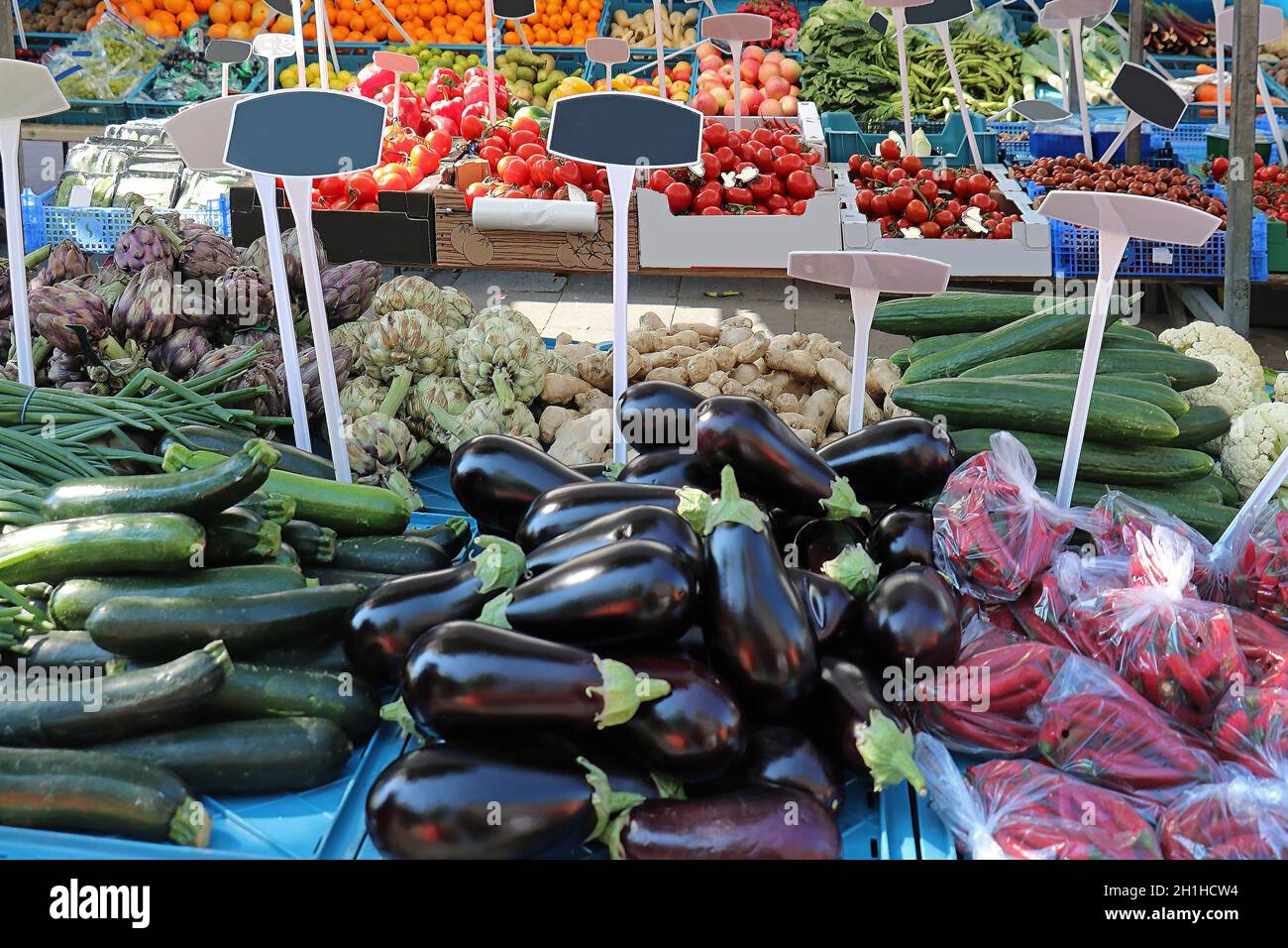 Fresh organic ripe vegetables piles sold on market stall Stock Photo ...