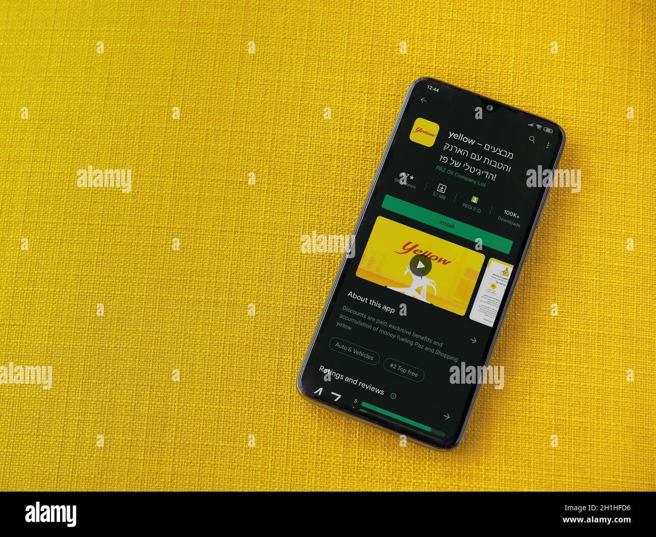 Lod, Israel - July 8, 2020: Yellow app play store page on the display ...