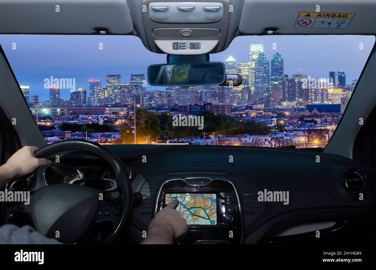 Driving a car while using the touch screen of a GPS navigation system