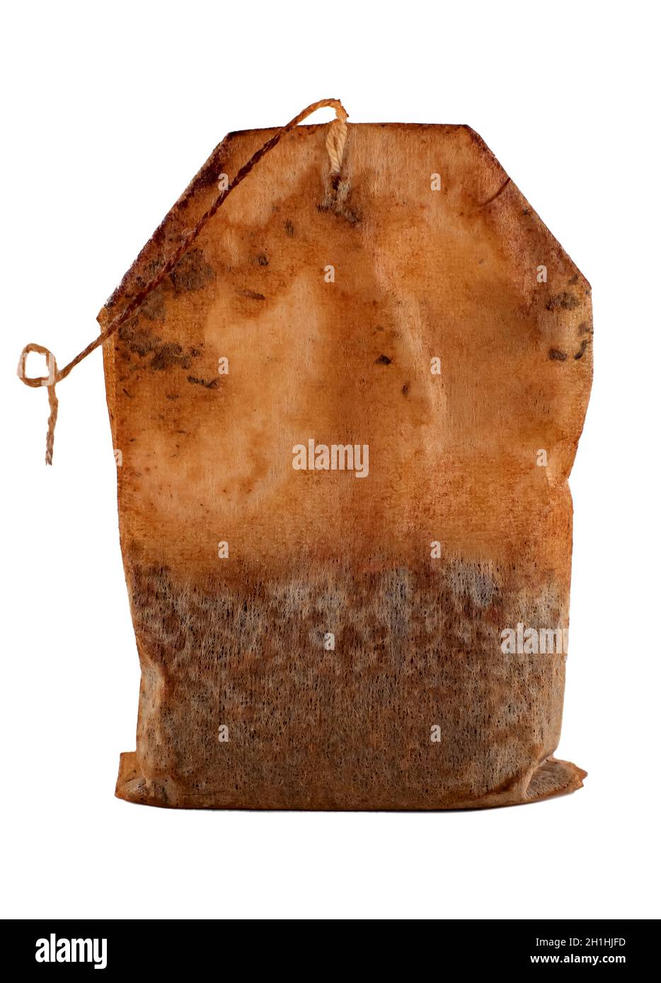 Tea bag after brewing tea on a white background. Wet Tea Bag Isolate