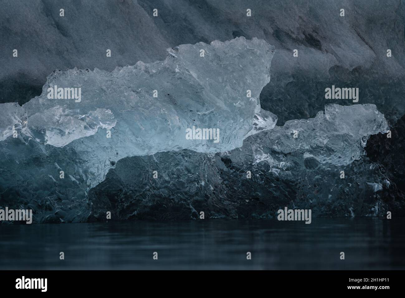 Icebergs floating. Ices and icebergs. Glacier lagoon. Greenland iceberg. Melting ice. South coast Iceland. Jokullsarlon glacier lagoon. Volcanic ash Stock Photo