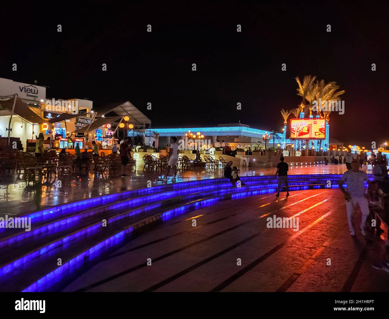 Sharm El Sheikh, Egypt - September 13, 2020: SOHO Square. Luminous palm trees at Soho, Egypt at Sharm El Sheikh. SOHO Squire in Sharm El Sheikh - a wa Stock Photo