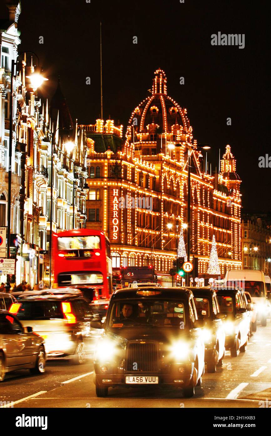 LONDON, UK - DEC 3 : London Taxi, also called hackney carriage, black cab. Traditionally Taxi cabs are all black in London but now produced in various Stock Photo