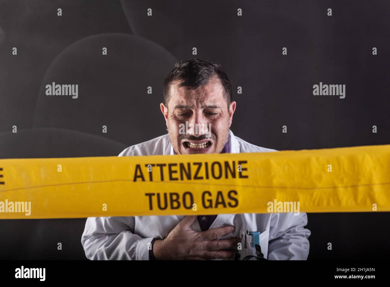 A medical engineer intoxicated by gas during the gas leaks crisis. On the yellow tape the