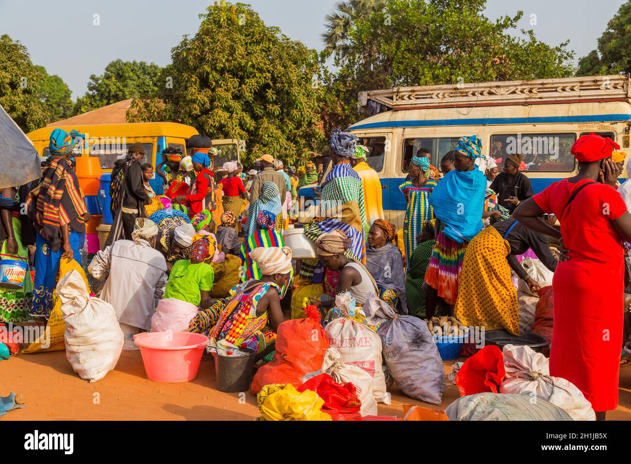 Bissau, Republic of Guinea-Bissau - January 6, 2020: Street scene in the city of Bissau with people at the street market, Guinea Bissau Stock Photo