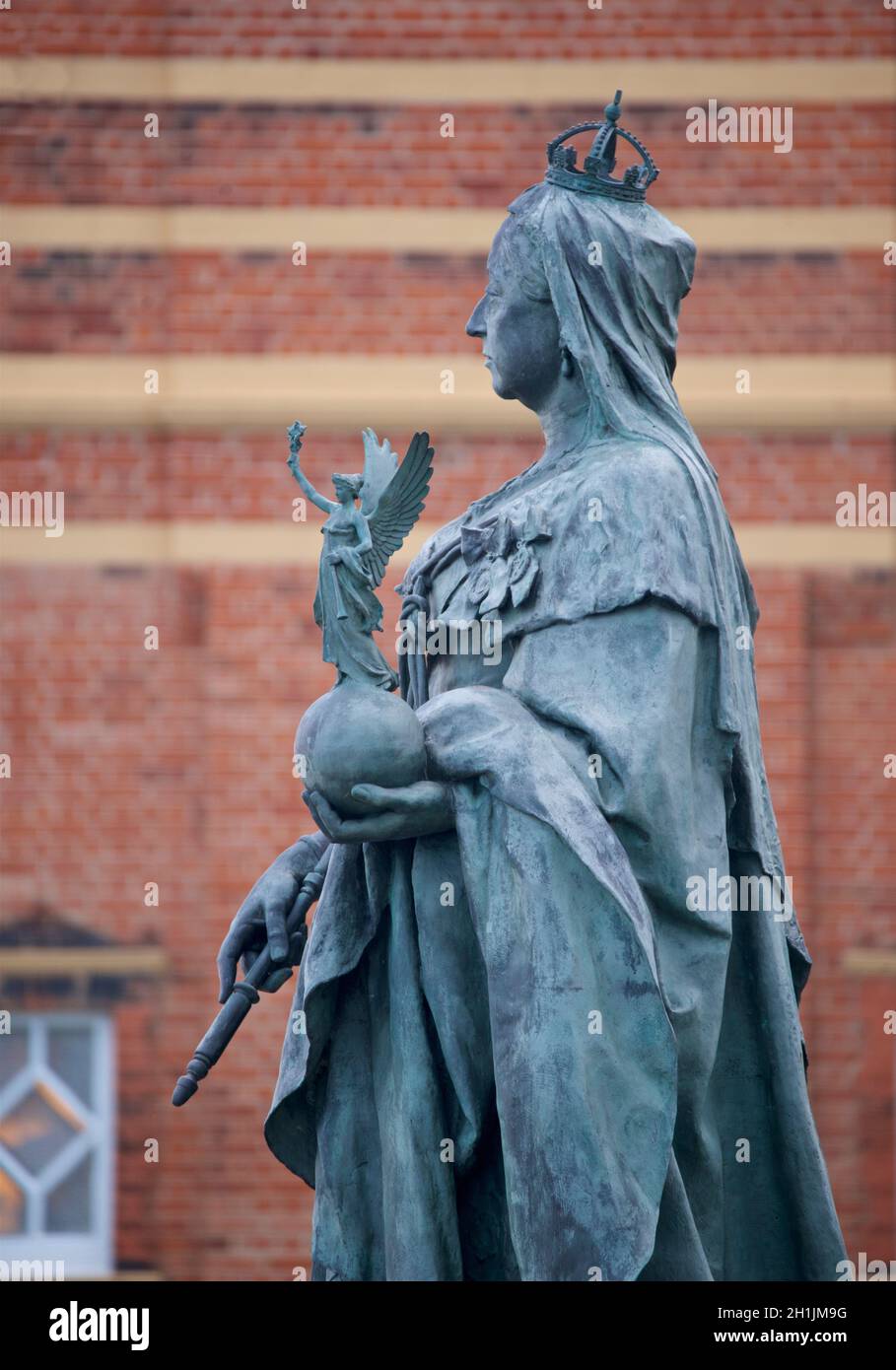 Detail of bronze statue of Queen Victoria at the bottom of Grand Avenue, Hove, East Sussex