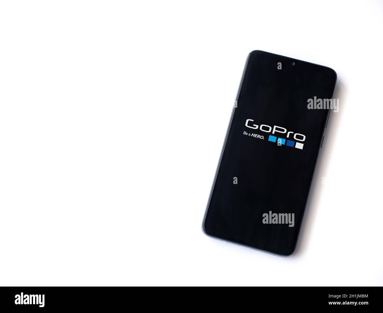 Lod, Israel - July 8, 2020: GoPro - Video Editor & Movie Maker app launch screen with logo on the display of a black mobile smartphone isolated on whi Stock Photo