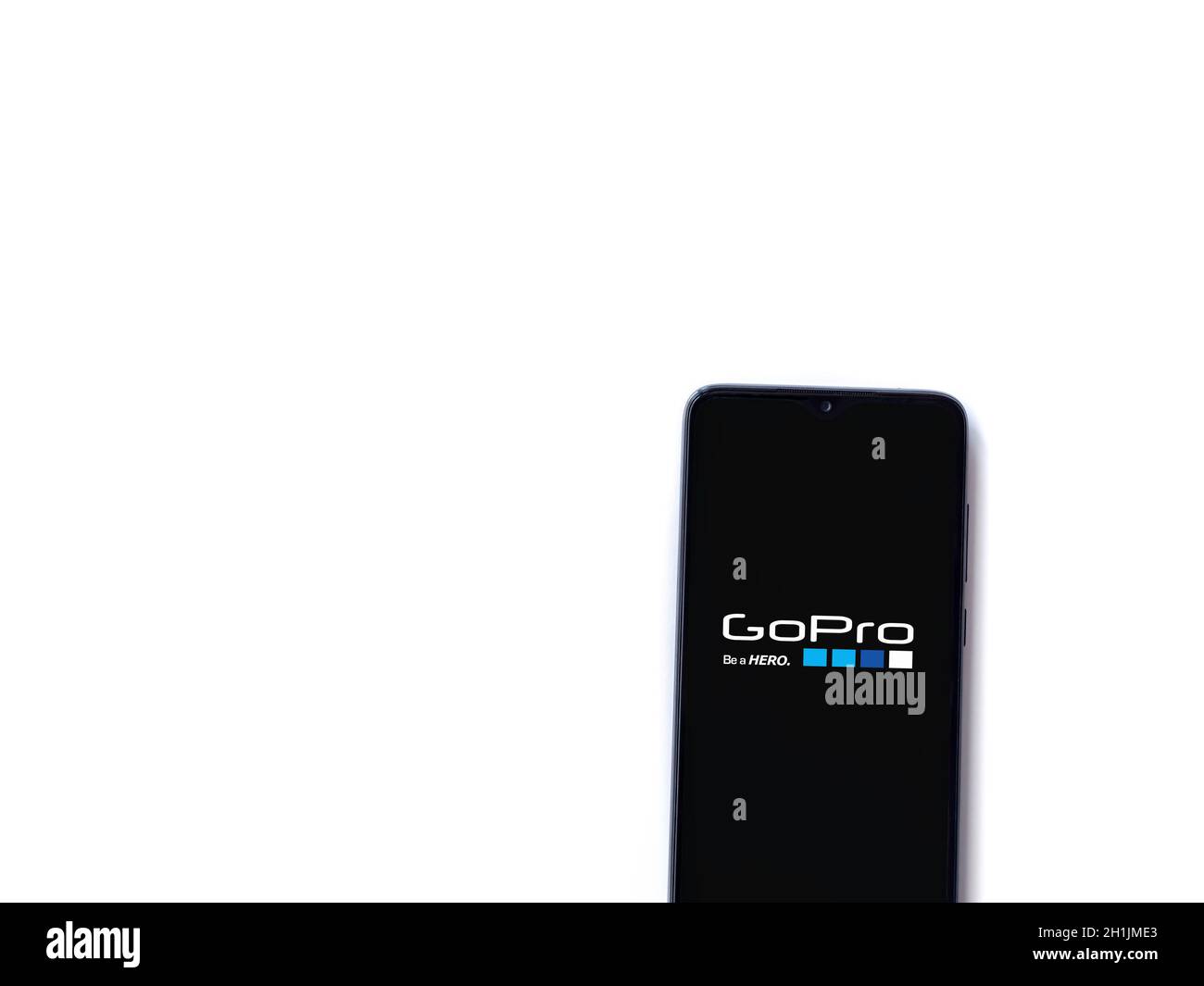 Lod, Israel - July 8, 2020: GoPro - Video Editor & Movie Maker app launch screen with logo on the display of a black mobile smartphone isolated on whi Stock Photo