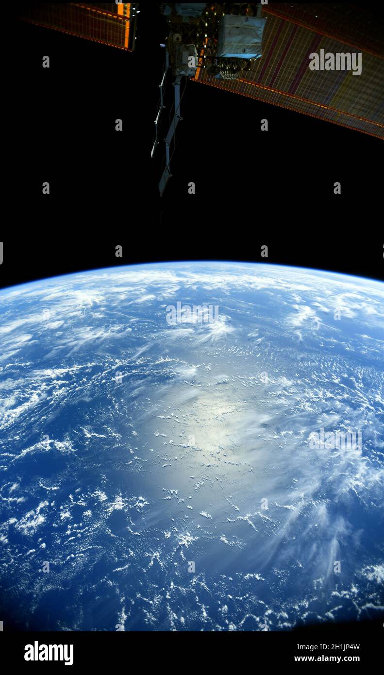A view of Earth from the International Space Station: earth curvature and ocean.   An optimised and digitally enhanced version of a NASA/ ESA image. Mandatory Credit: NASA/ESA/T. Pesquet. NB: Usage restrictions: Not to be presented as an endorsement. Stock Photo