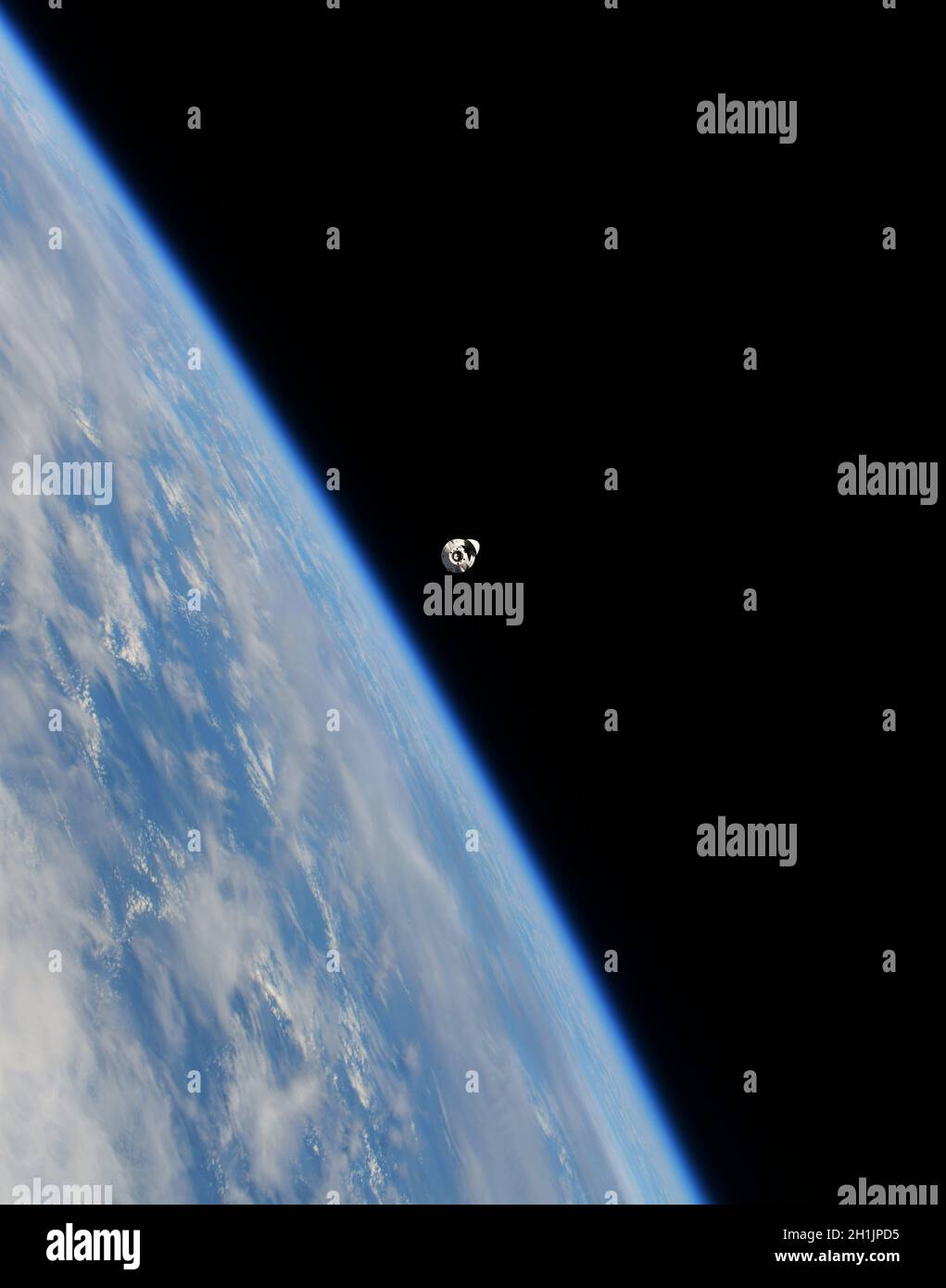 A view of Earth from the International Space Station:  Restocking the ISS and delivering new scientific experiments. Docking of SpaceX vehicles is automated. This spacecraft will return samples and equipment to Earth. An optimised and digitally enhanced version of a NASA/ ESA image. Mandatory Credit: NASA/ESA/T. Pesquet. NB: Usage restrictions: Not to be presented as an endorsement. Stock Photo