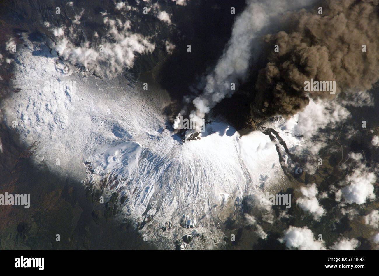 SICILY Features: MOUNT ETNA ERUPTION PLUME  7/11/02  An optimised and enhanced version of a NASA image / credit NASA. Stock Photo