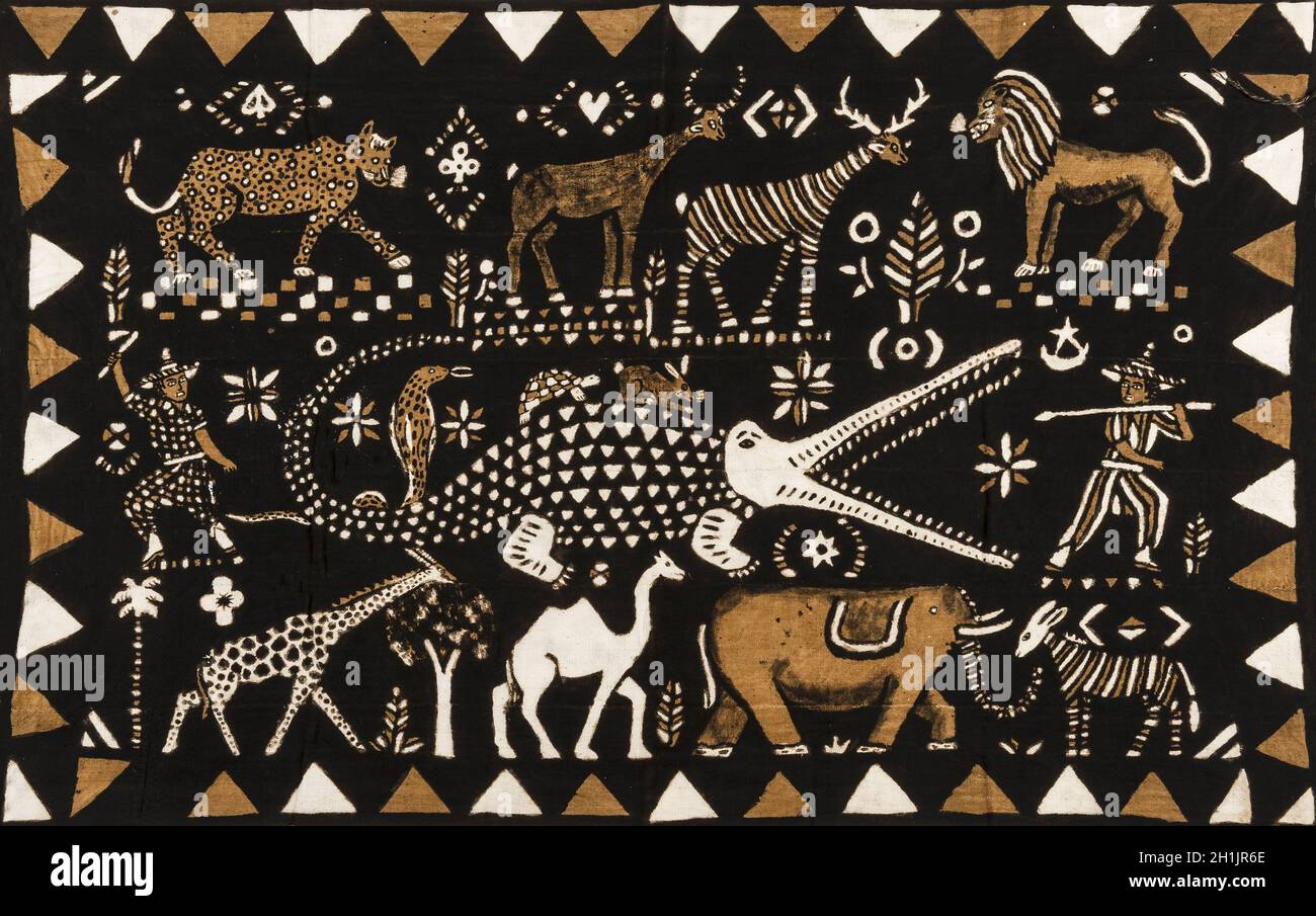 Traditional mud cloth, now called Bogolanfini depicting various animals and two hunters. The use of mud as a painting pattern on cotton is typical of the Bamana (Bamara) of Mali, centred on the Beledougou area north and northeast of Bamako. Women spin the locally-grown cotton, then men weave long bands that are joined together. The designs of Bogolanfini are traditionally made by women Stock Photo