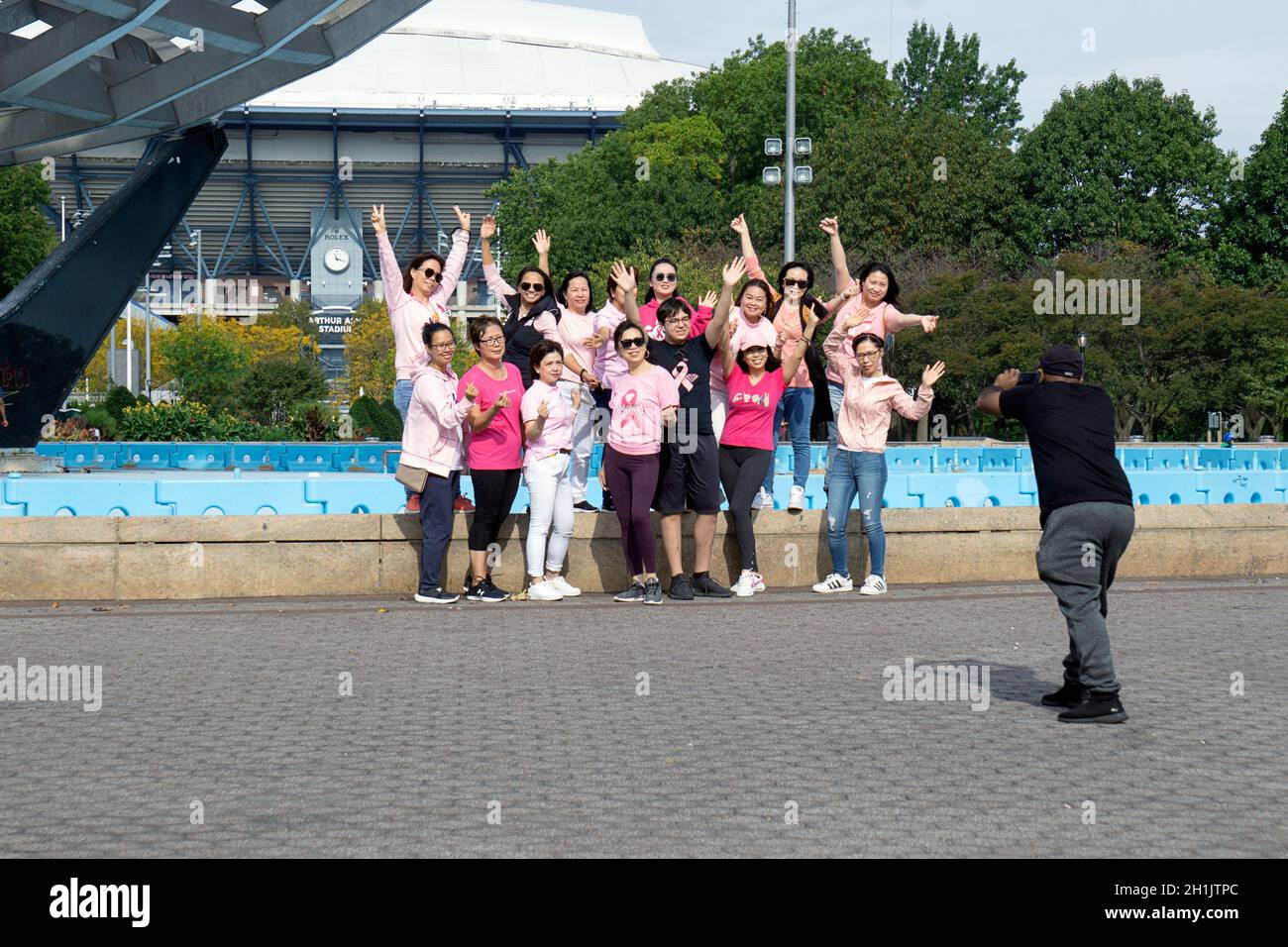 A group of hearing impaired Asian American women from the New York metropolitan area visit Flushing Meadows Corona Park and pose for photos. Stock Photo