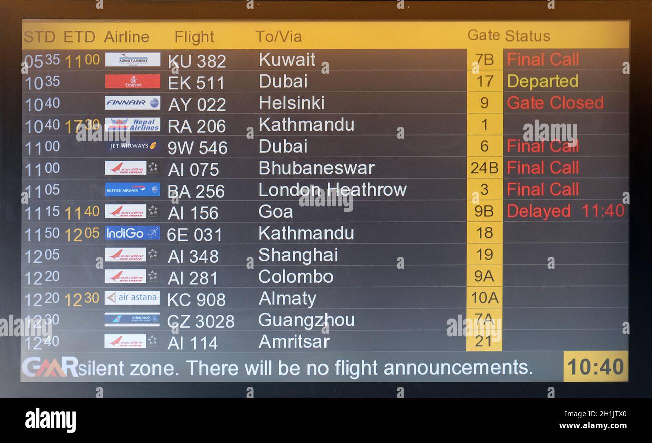 Flight board at the airport in Delhi airport, India Stock Photo Alamy