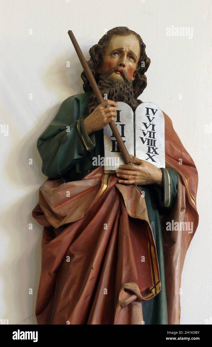 Moses holding the Ten Commandments Stock Photo