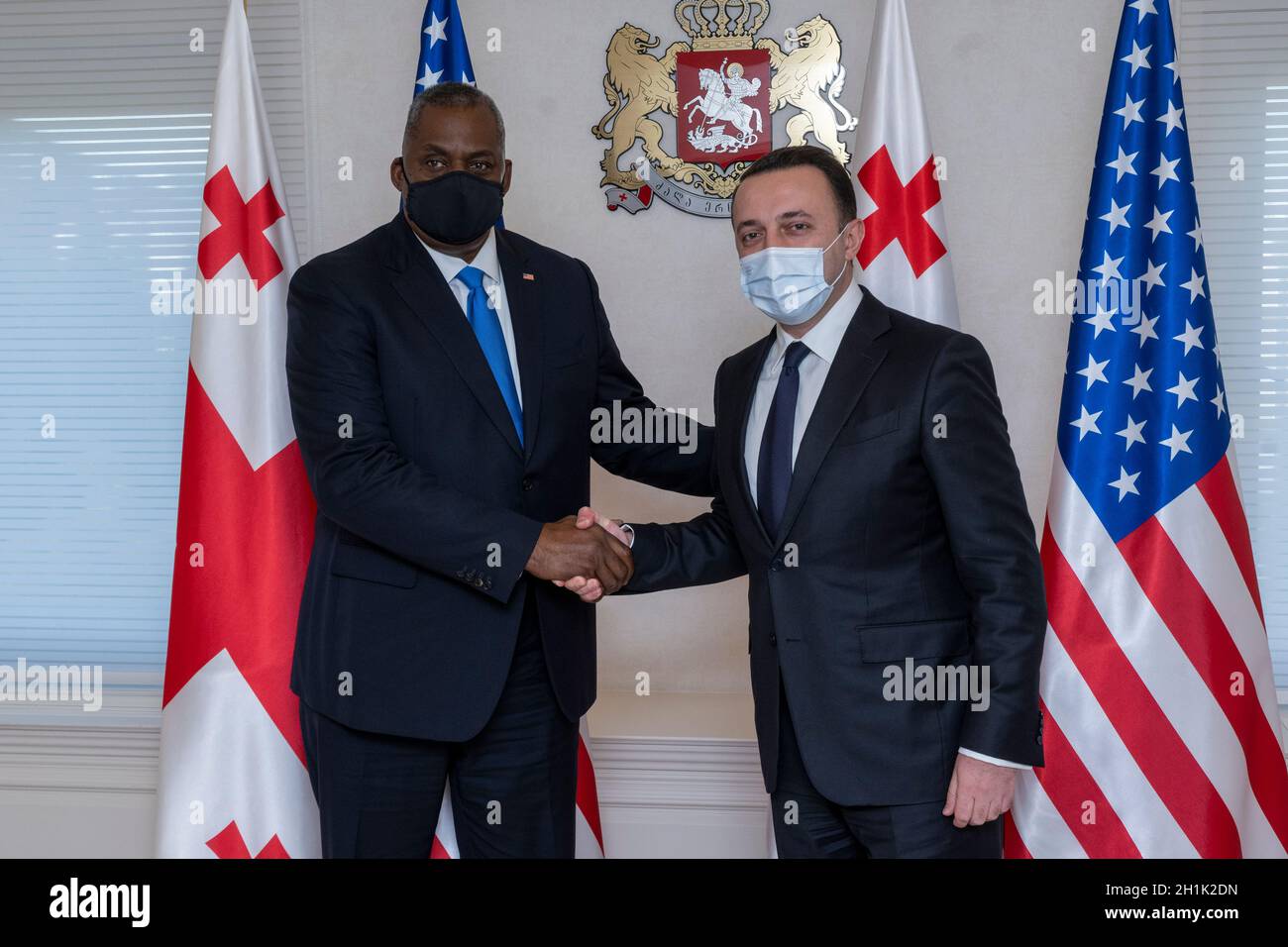 Tbilisi, Georgia. 18th Oct, 2021. U.S. Secretary of Defense Lloyd J. Austin III, is welcomed by Georgian Prime Minsiter Irakli Garibashvili, right, for bilateral discussions at the Prime Ministers office October 18, 2021 in Tbilisi, Georgia. Austin is in Tbilisi to reaffirm U.S. support for sovereignty and territorial integrity. Credit: Chad McNeeley/DOD/Alamy Live News Stock Photo