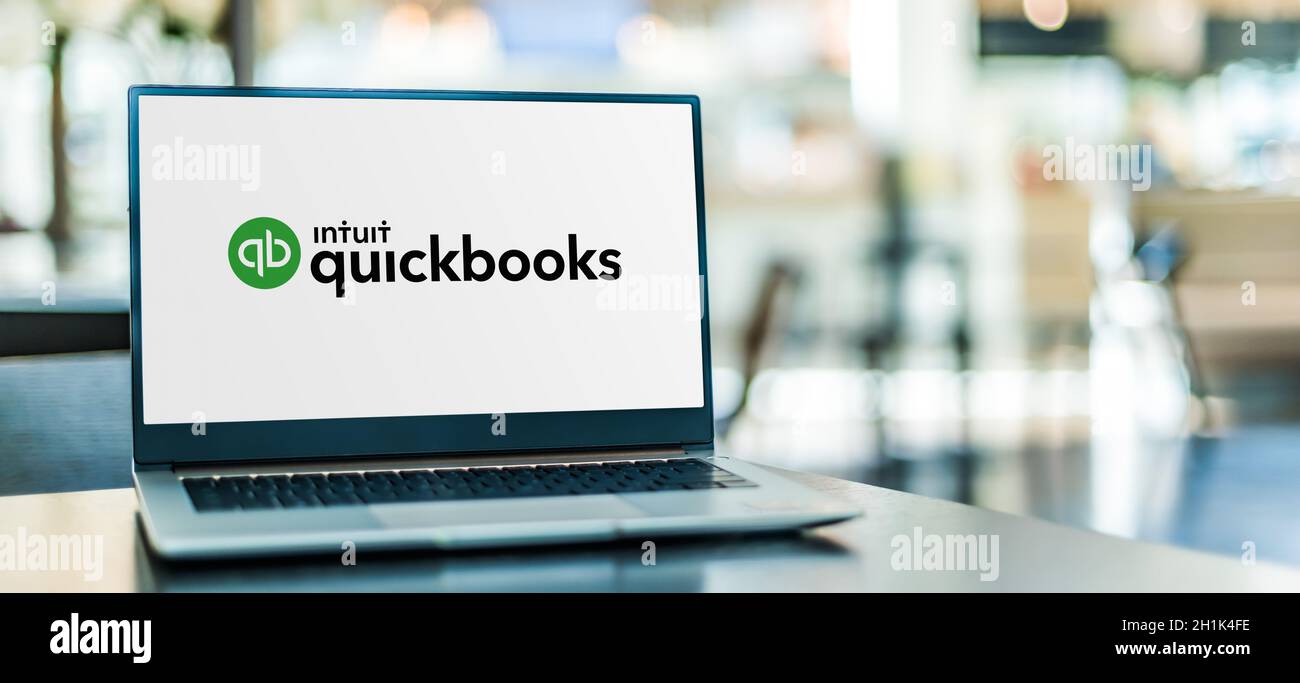 POZNAN, POL - SEP 23, 2020: Laptop computer displaying logo of QuickBooks, an accounting software package developed and marketed by Intuit Stock Photo