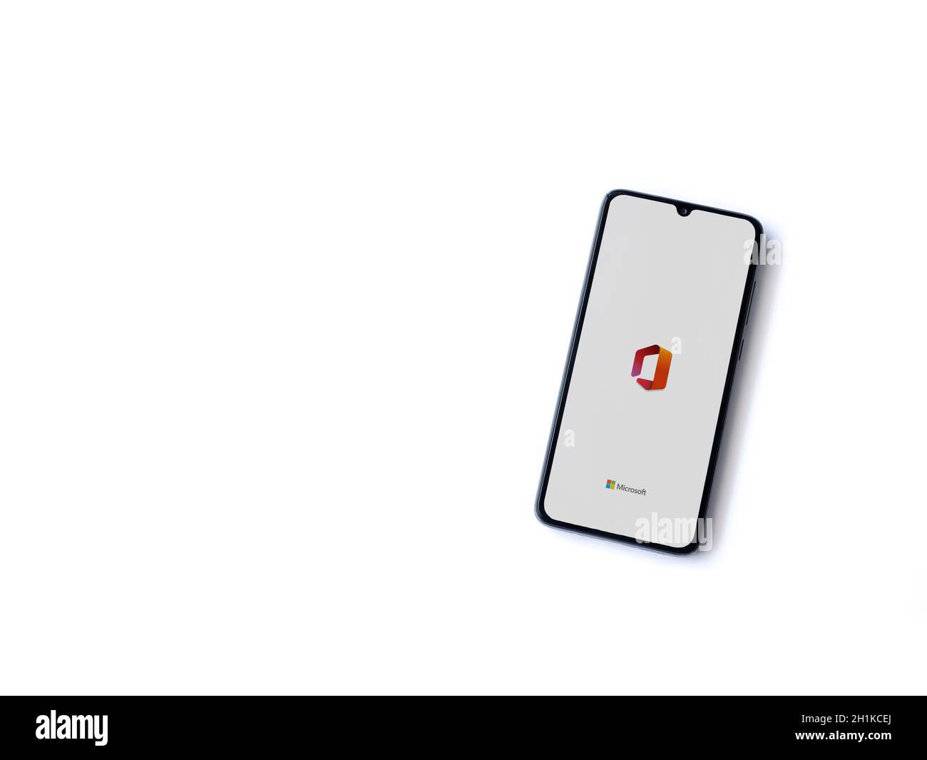 Lod, Israel - July 8, 2020: Microsoft Office app launch screen with logo on the display of a black mobile smartphone isolated on white background. Top Stock Photo