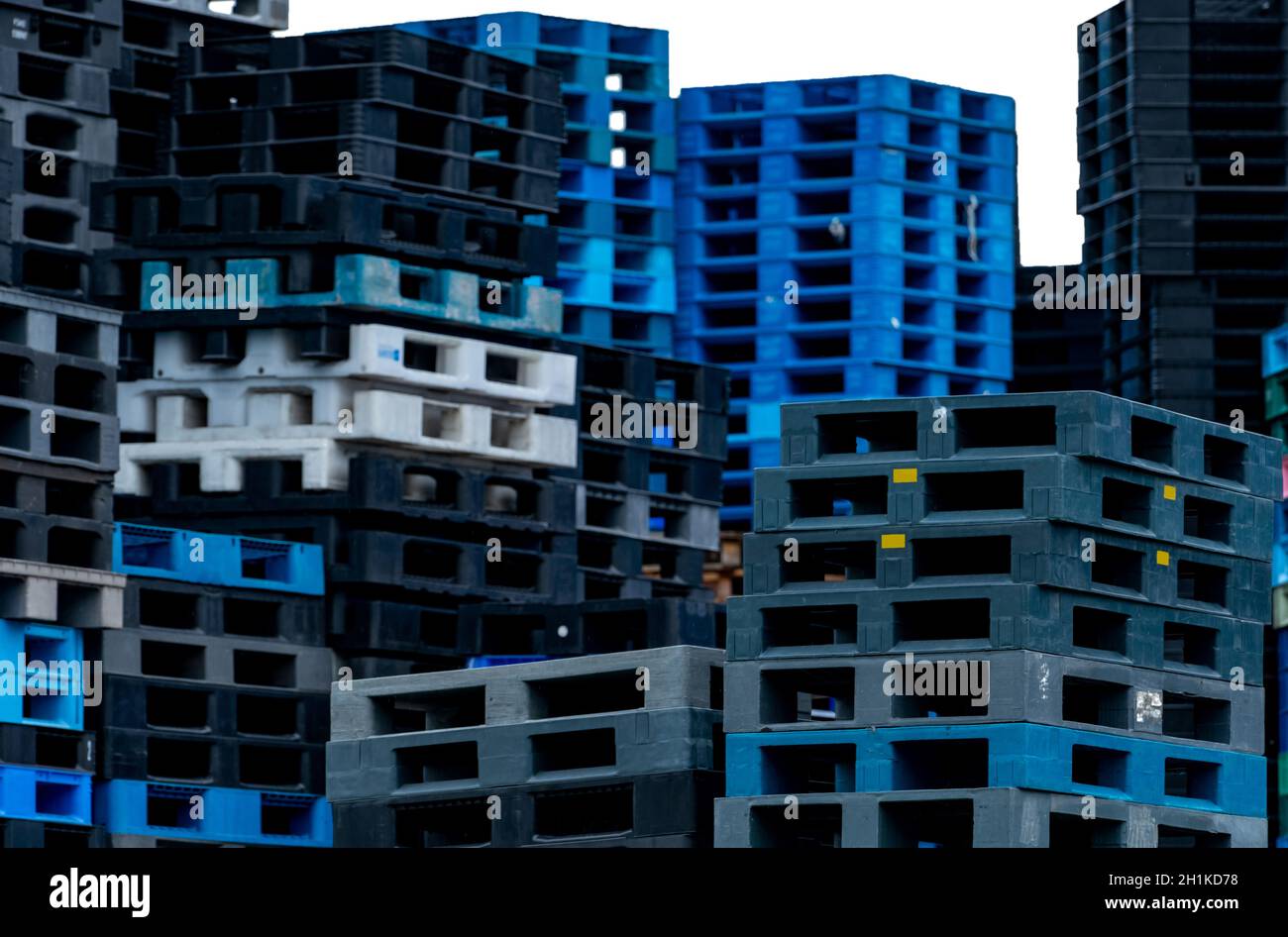Selective focus on plastic shipping pallet stack. Industrial plastic ...