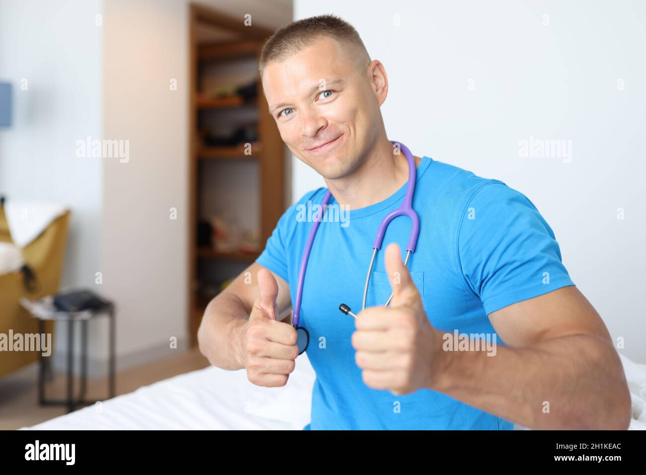 Portrait young family doctor hi-res stock photography and images - Alamy