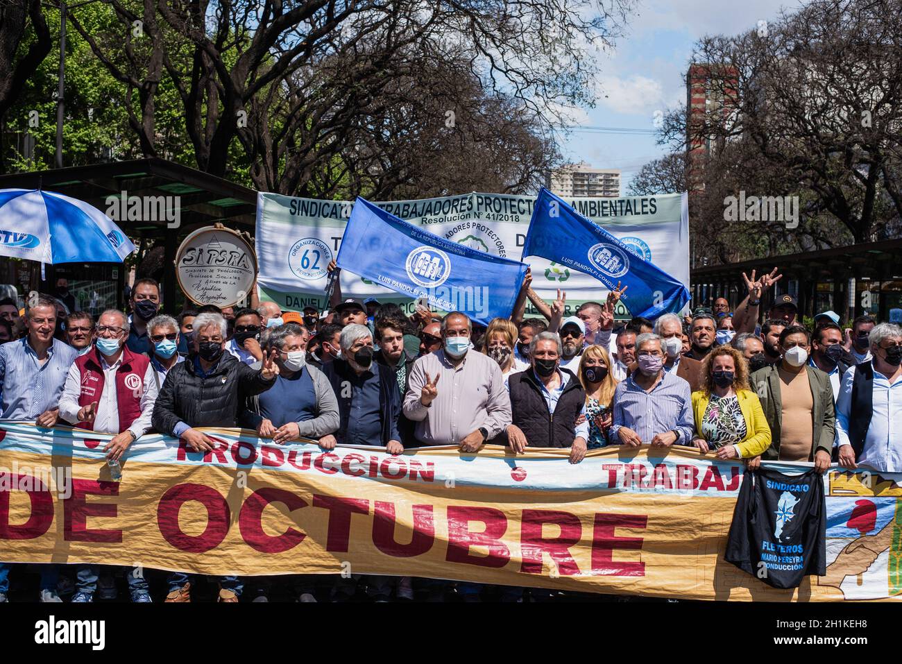 Buenos Aires, Argentina. 18th Oct, 2021. Union representatives Victor Santa Maria, Hugo Moyano, Hector Daer along with other members are seen holding a banner on the day of Peronist loyalty.The General Confederation of Labor (CGT) and Social Movements carried out a mobilization towards the Monument to Work in celebration of the day of Peronist loyalty. (Photo by Alejo Manuel Avila/SOPA Images/Sipa USA) Credit: Sipa USA/Alamy Live News Stock Photo