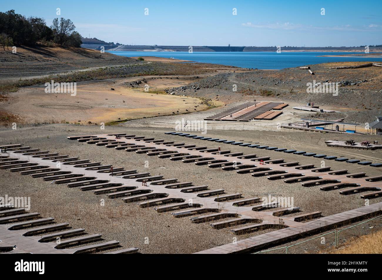 View of rows of empty docks at Brown's Ravine marina at Folsom Lake.  Water levels are at historic lows due to lack of rain and hot weather. Stock Photo