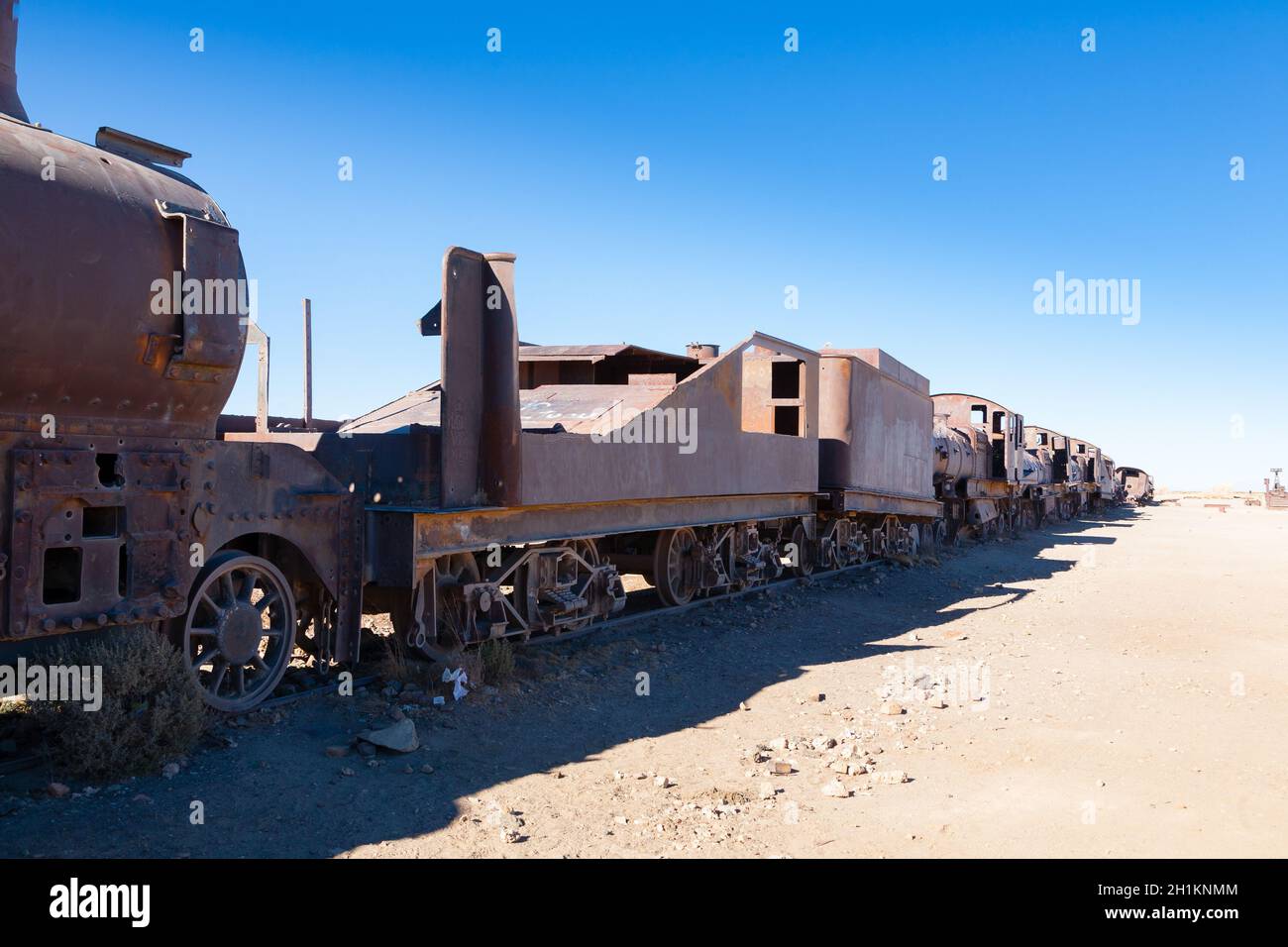 Cemetery trains view from Uyuni, Bolivia. Bolivian landmark. Abandoned locomotives Stock Photo