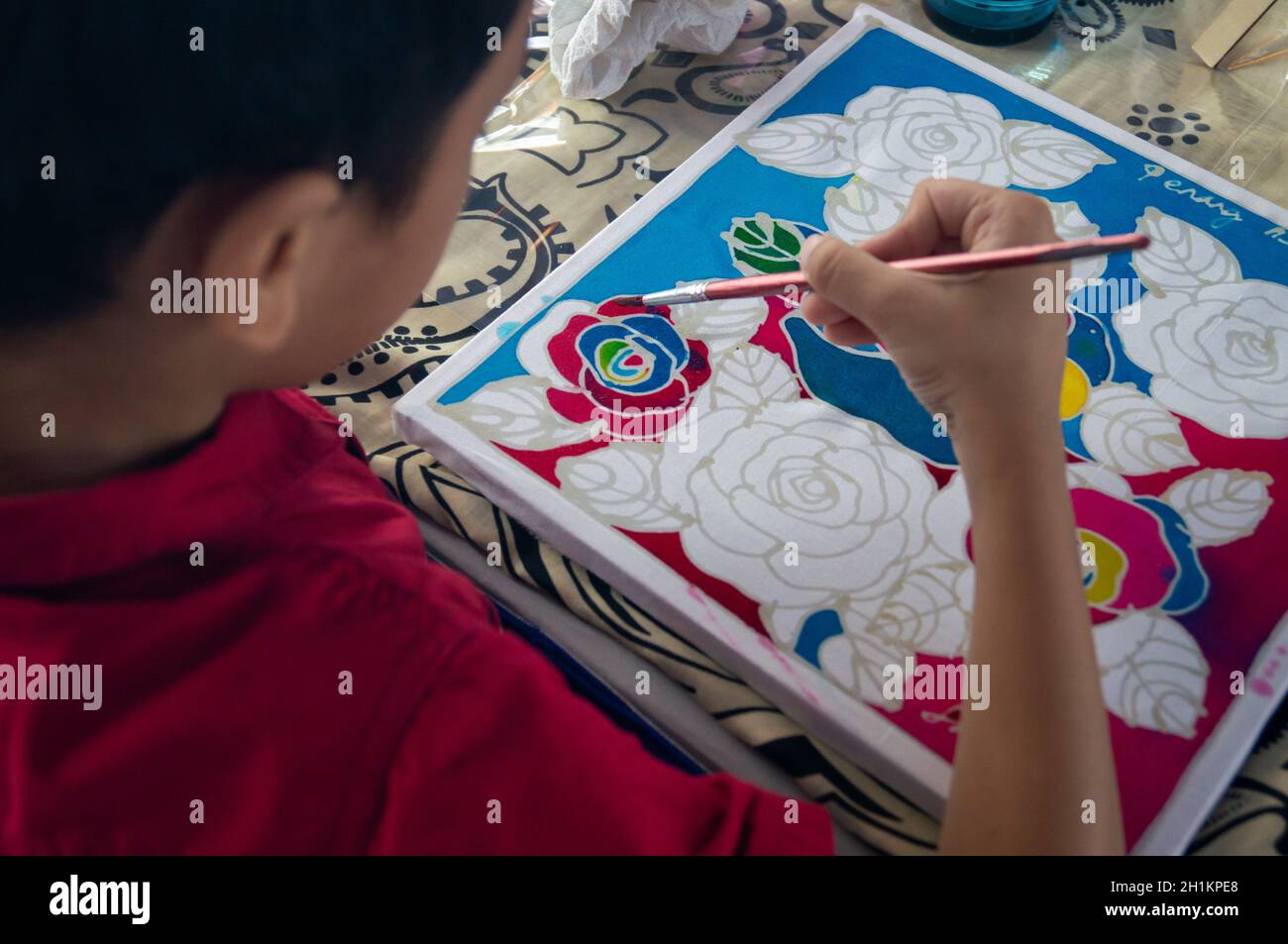 Georgetown, Penang/Malaysia - Feb 15 2020: A kid draw batik. Stock Photo
