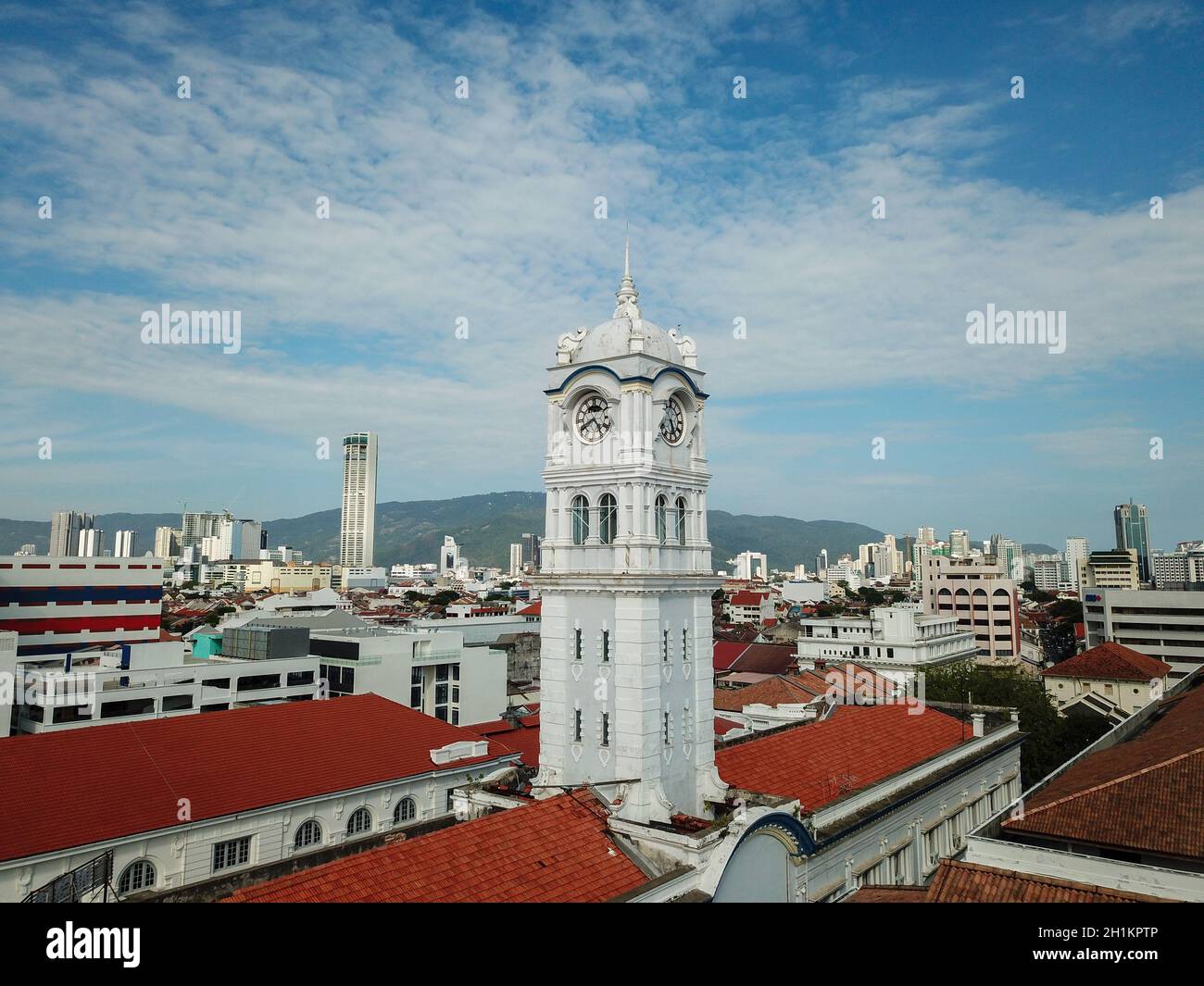 Georgetown, Penang/Malaysia - Feb 28 2020: Clock Tower at Malayan Railway Building with background KOMTAR tower. Stock Photo