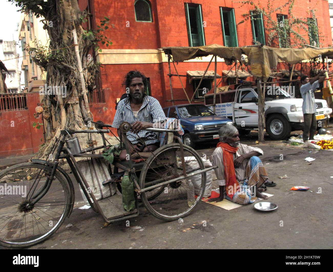 Streets of Kolkata. Thousands of beggars are the most disadvantaged castes living in the streets. Stock Photo