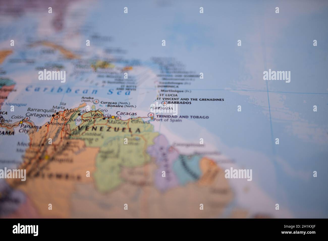 Island country Grenada on a map of South America with its main roads in red and the rest of the countries blurred out Stock Photo