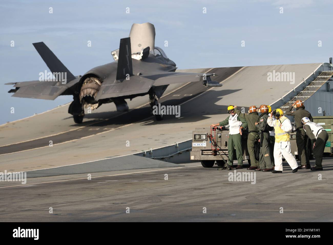 Bay of Bengal, India. 17th Oct, 2021. A Royal Air Force F-35B Lightning II stealth fighter jet with the RAF 617 Squadron, launches from the flight deck of the Royal Navy Fleet Flagship HMS Queen Elizabeth during Carrier Integration Operations with the U.S. Navy October 17, 2021 in the Bay of Bengal, India. Credit: Unaisi Luke/U.S. Marine Corps/Alamy Live News Stock Photo