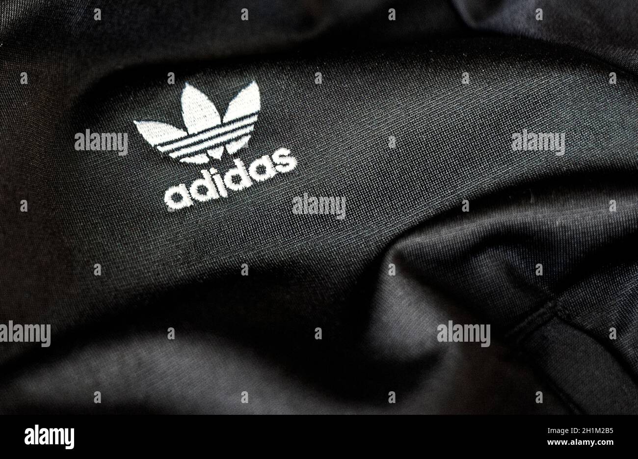 White adidas track suit hi-res stock photography and images - Alamy