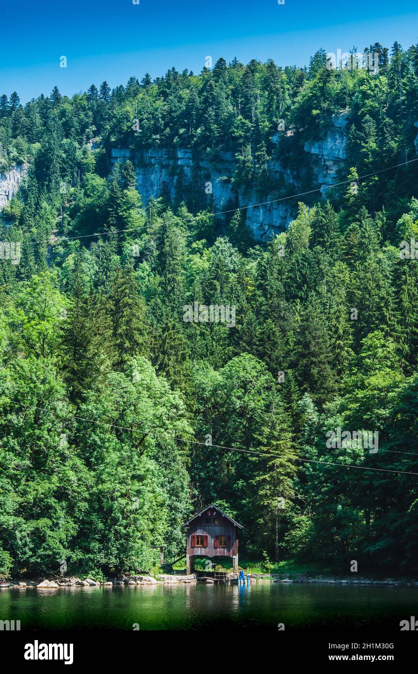 Atypical house in the Doubs gorges on the Franco-Swiss border in France Stock Photo