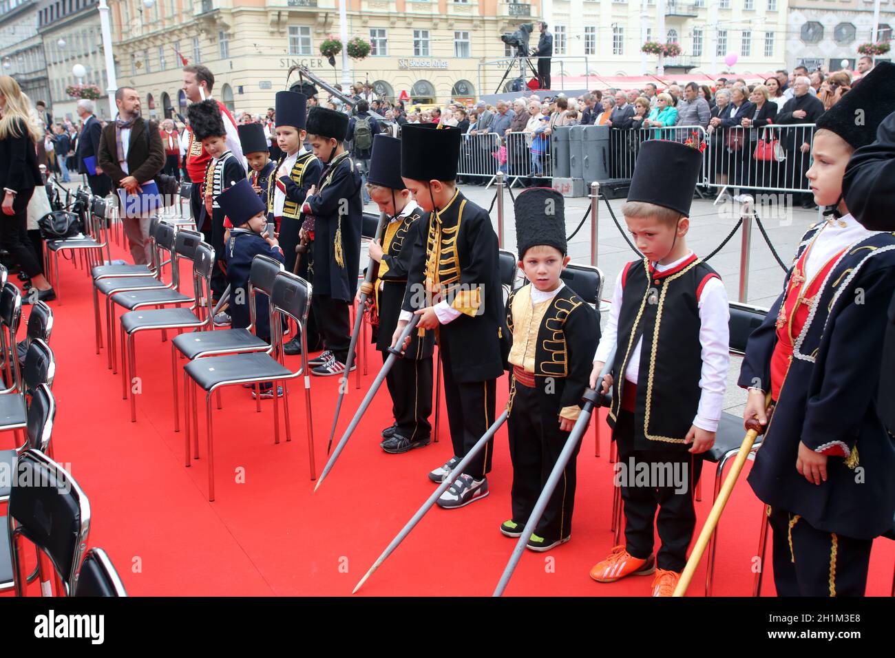 Parade of 70 participants, thirty horses and forty members of a brass band to the main square were announced next, 300th Sinjska Alka in Zagreb Stock Photo