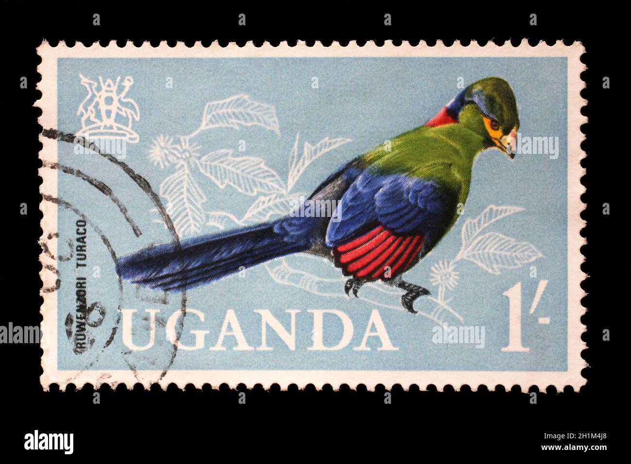 Stamp issued in Uganda shows Ruwenzori Turaco (Ruwenzorornis johnstoni), circa 1965. Stock Photo