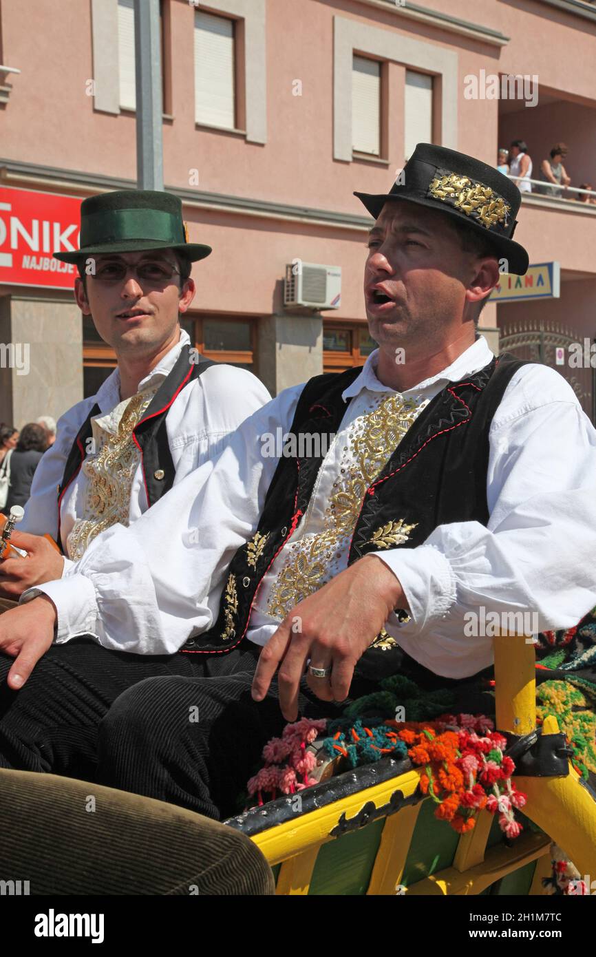 Participant in Croatian national costume, during the Dakovacki vezovi (Dakovo Summer Festival) in Dakovo, Croatia. Stock Photo