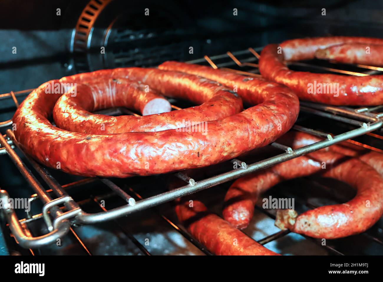 Hams Boiling Racks Racks of ham sausages drying in an oven after being cooked Stock Photo ...