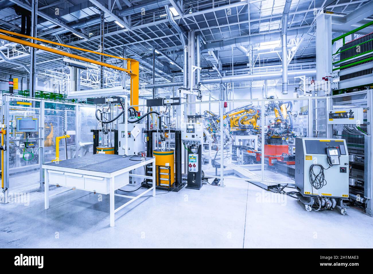 robotic arms in a car plant Stock Photo