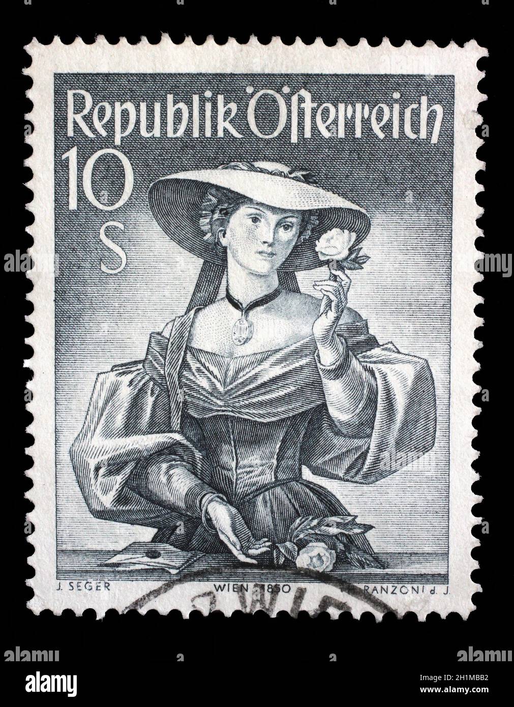Stamp printed by Austria, shows woman from Vienna (c. 1850), Lesachtal, Provincial Costumes series, circa 1948 Stock Photo