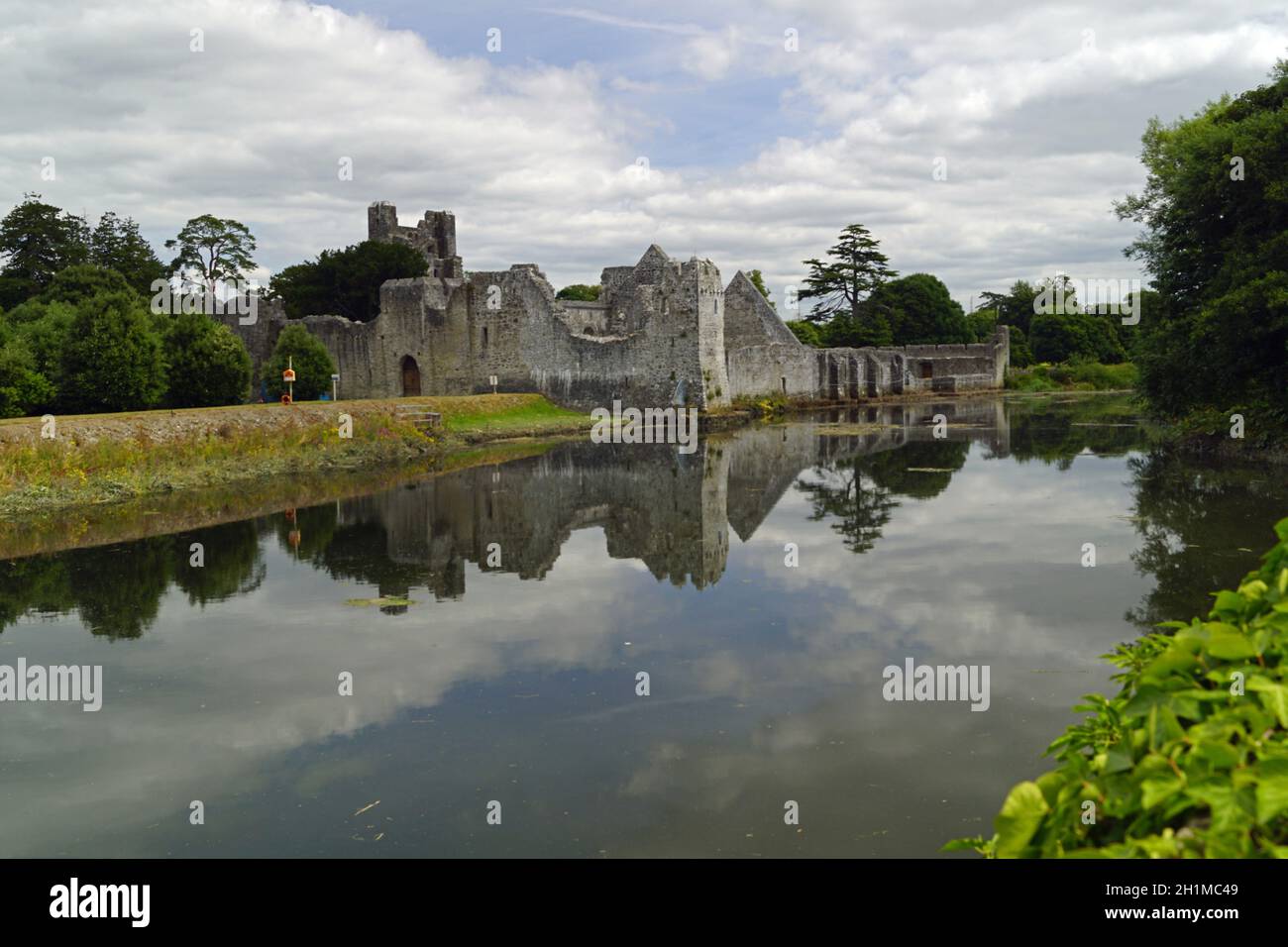 The Desmond Castle is located on the edge of the village of Adare, just