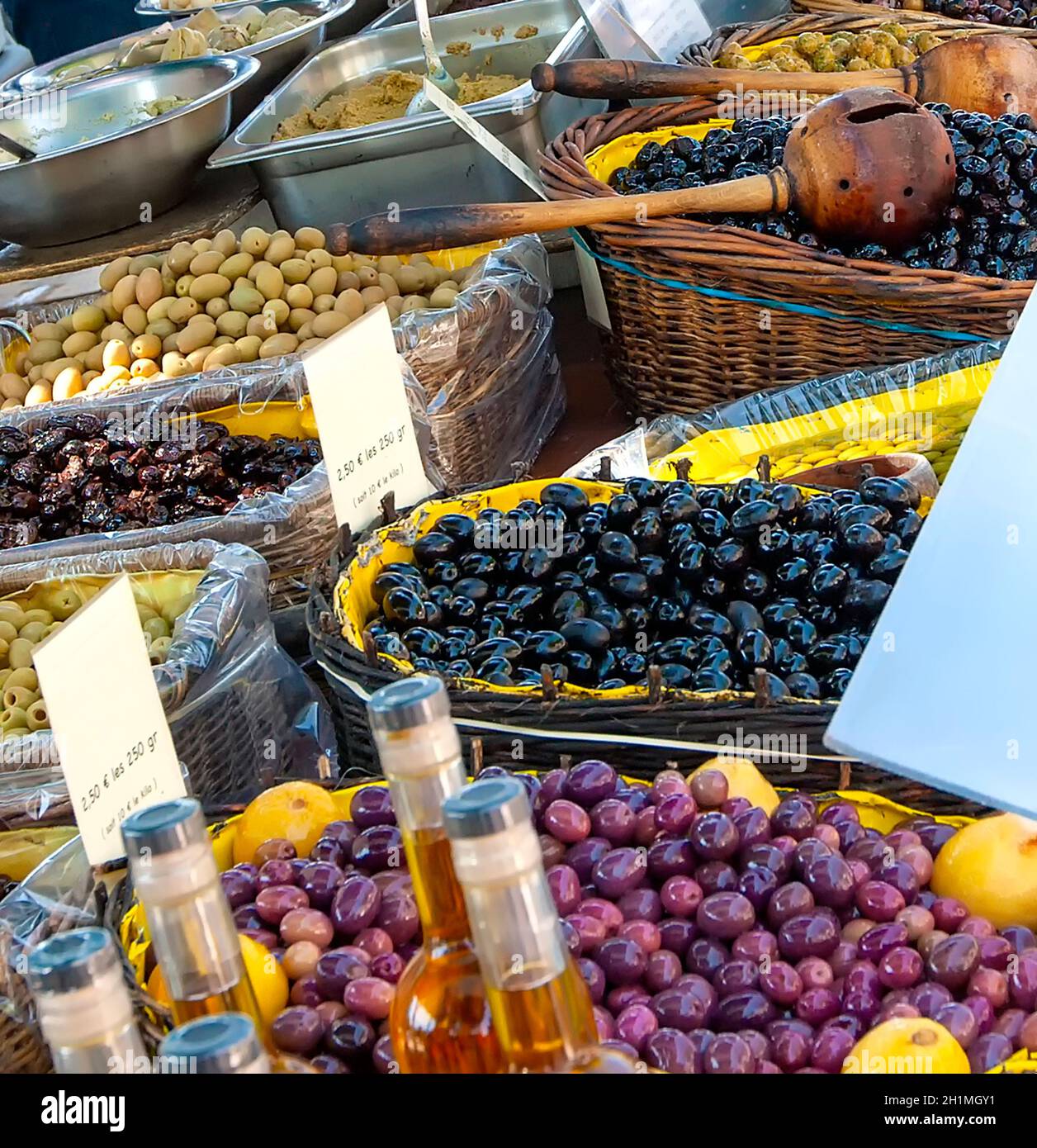 The olives on provencal street market in Provence, France. Selling and buying. Stock Photo