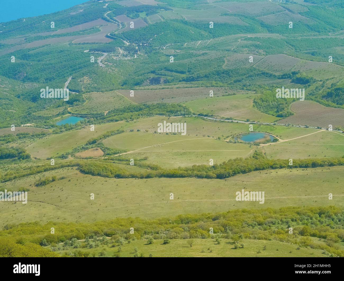 Crimean mountains. Mountains in Crimea at the sunny summer day. Alushta aerial view Stock Photo