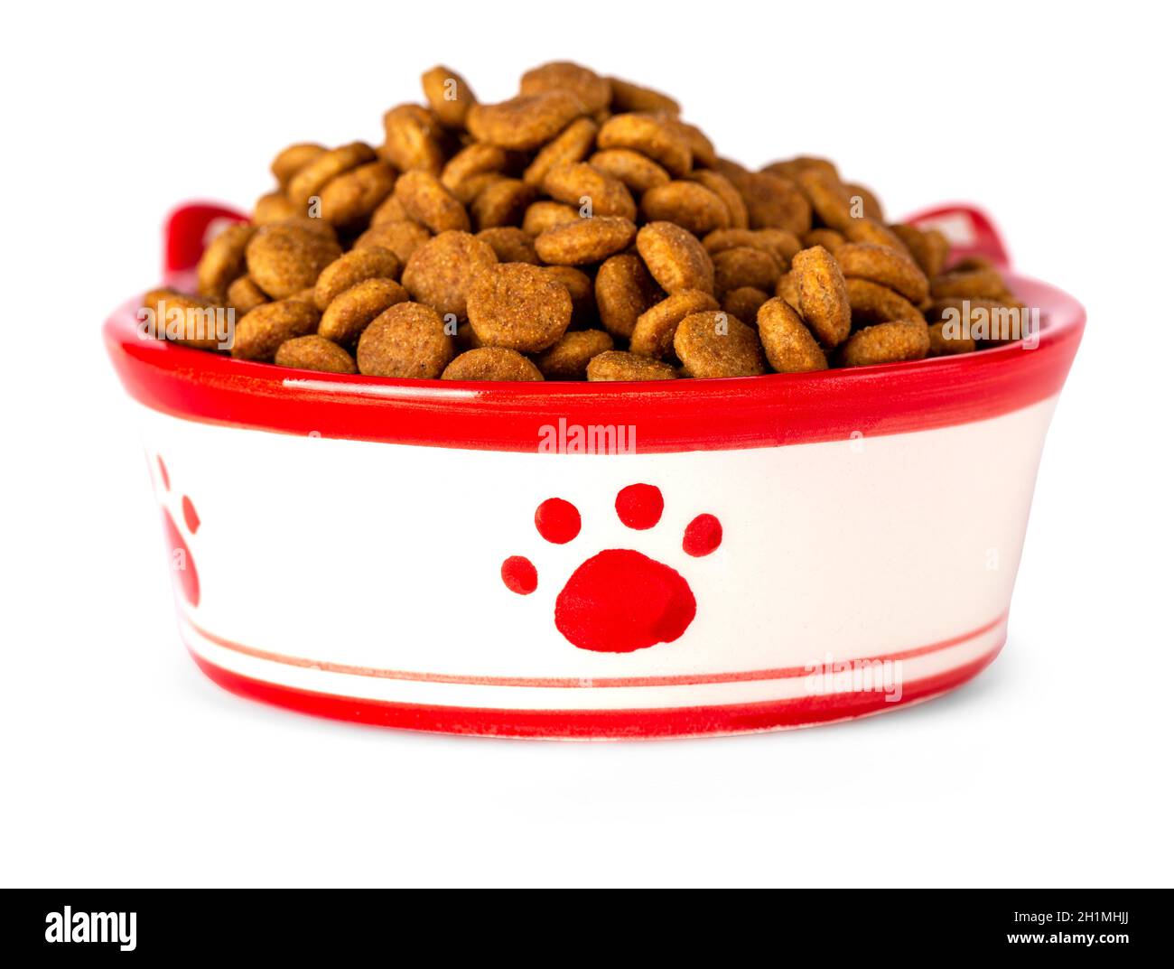 The Dry cat food in a bowl, isolated on white background Stock Photo
