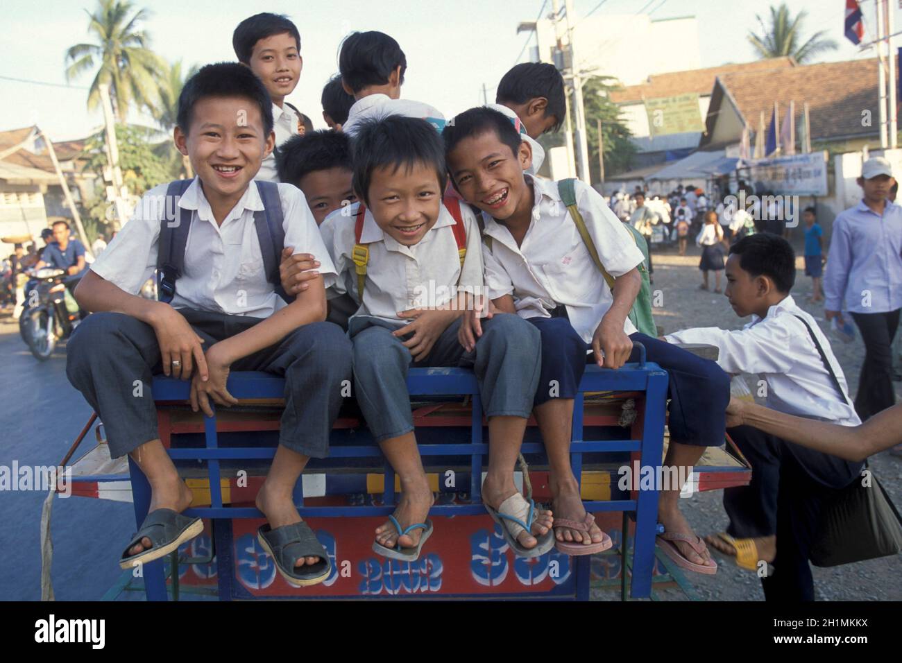 School childern on the way to school in the city of Phnom Penh of ...
