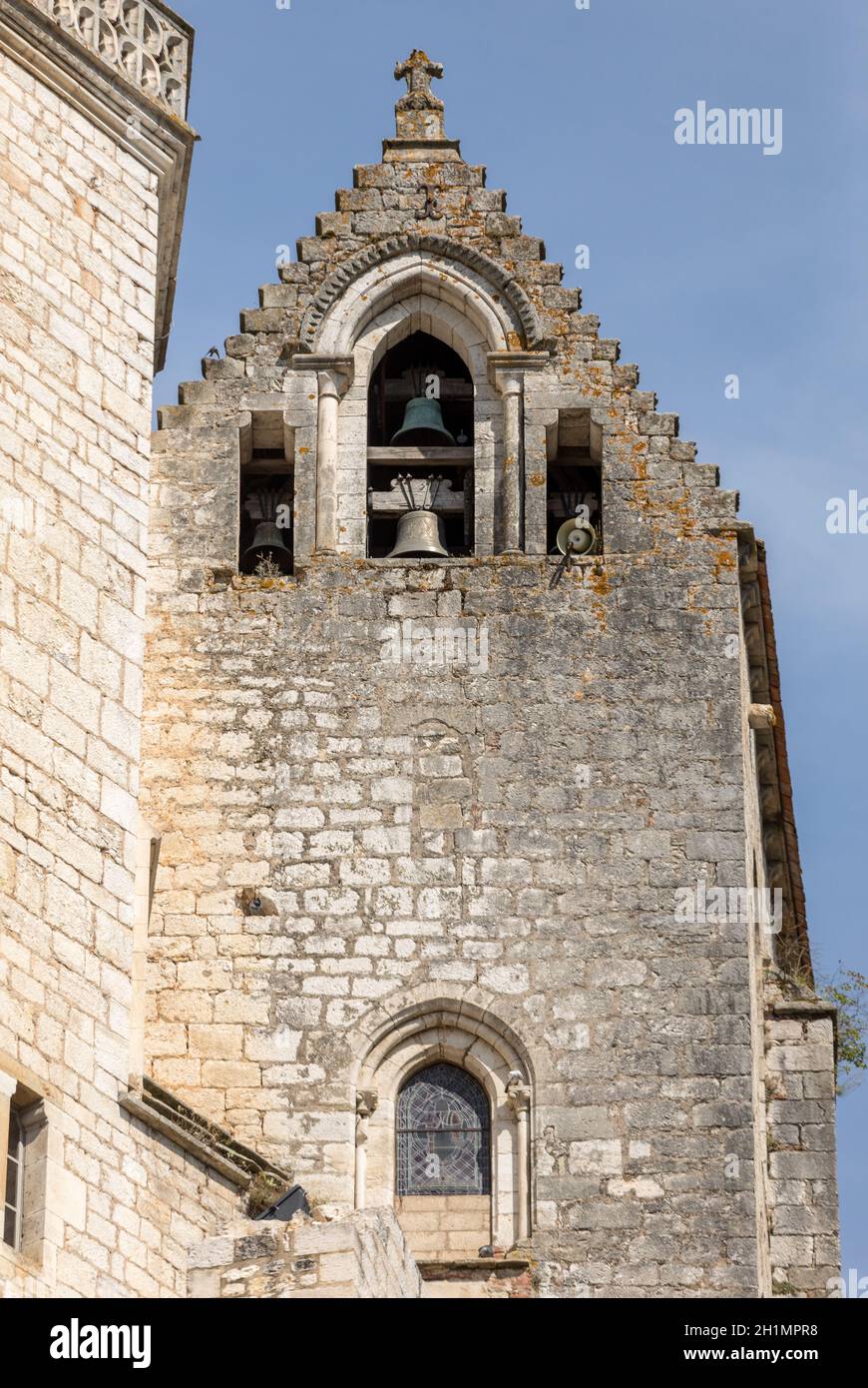 Basilica of St-Sauveur blend into the cliff in Rocamadour, France Stock Photo