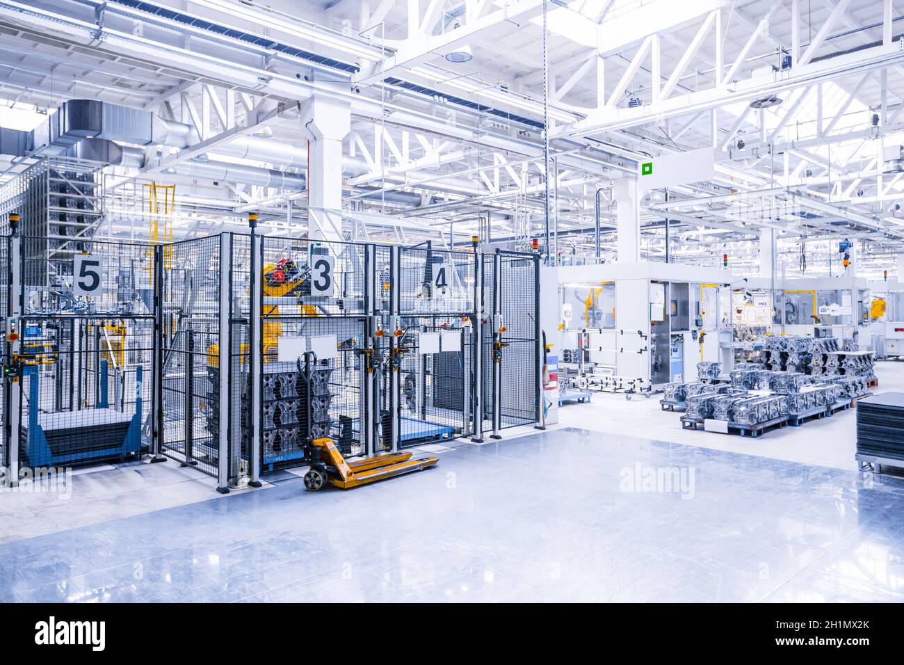 robotic arms in a car plant Stock Photo