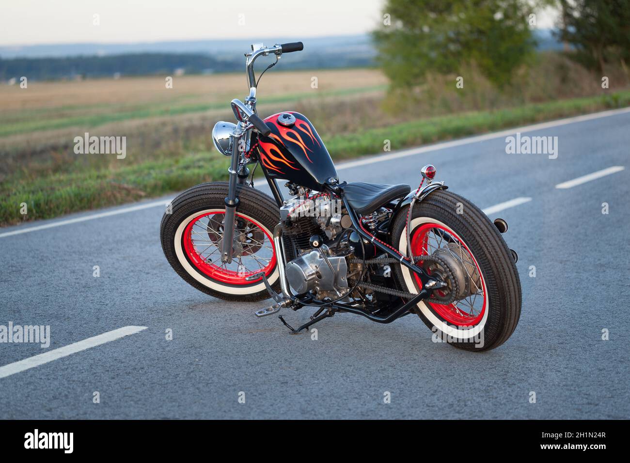 Custom bobber motorbike. Vintage style motorcycle standing on the